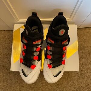 Jordan why not .5 size 10.5 black and bold red